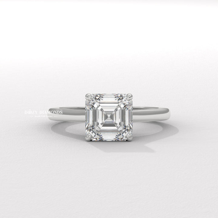 Asscher solitaire ring set with an IGI graded diamond
