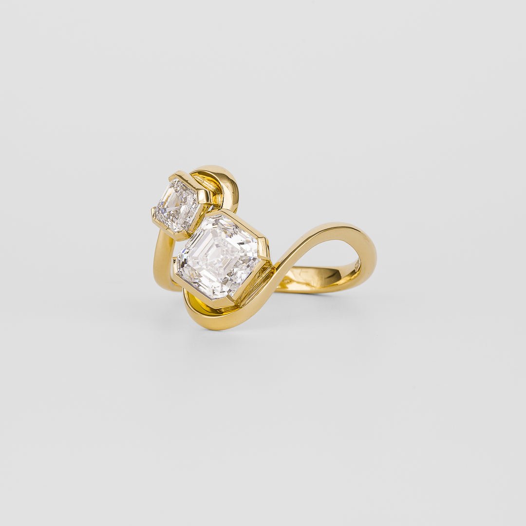 Asscher solitaire engagement ring shown on hand for true-to-life sizing
