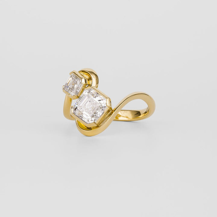 Asscher solitaire engagement ring shown on hand for true-to-life sizing