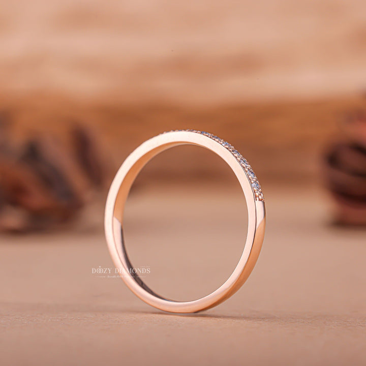 Round diamond band stacked with engagement ring