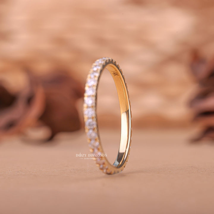 Round diamond band stacked with engagement ring