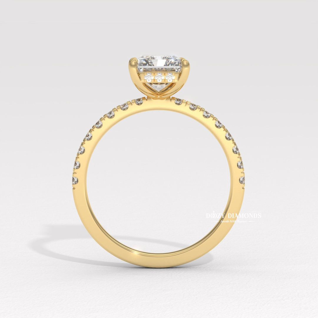 Radiant hidden halo diamond ring displayed on jewelry stand