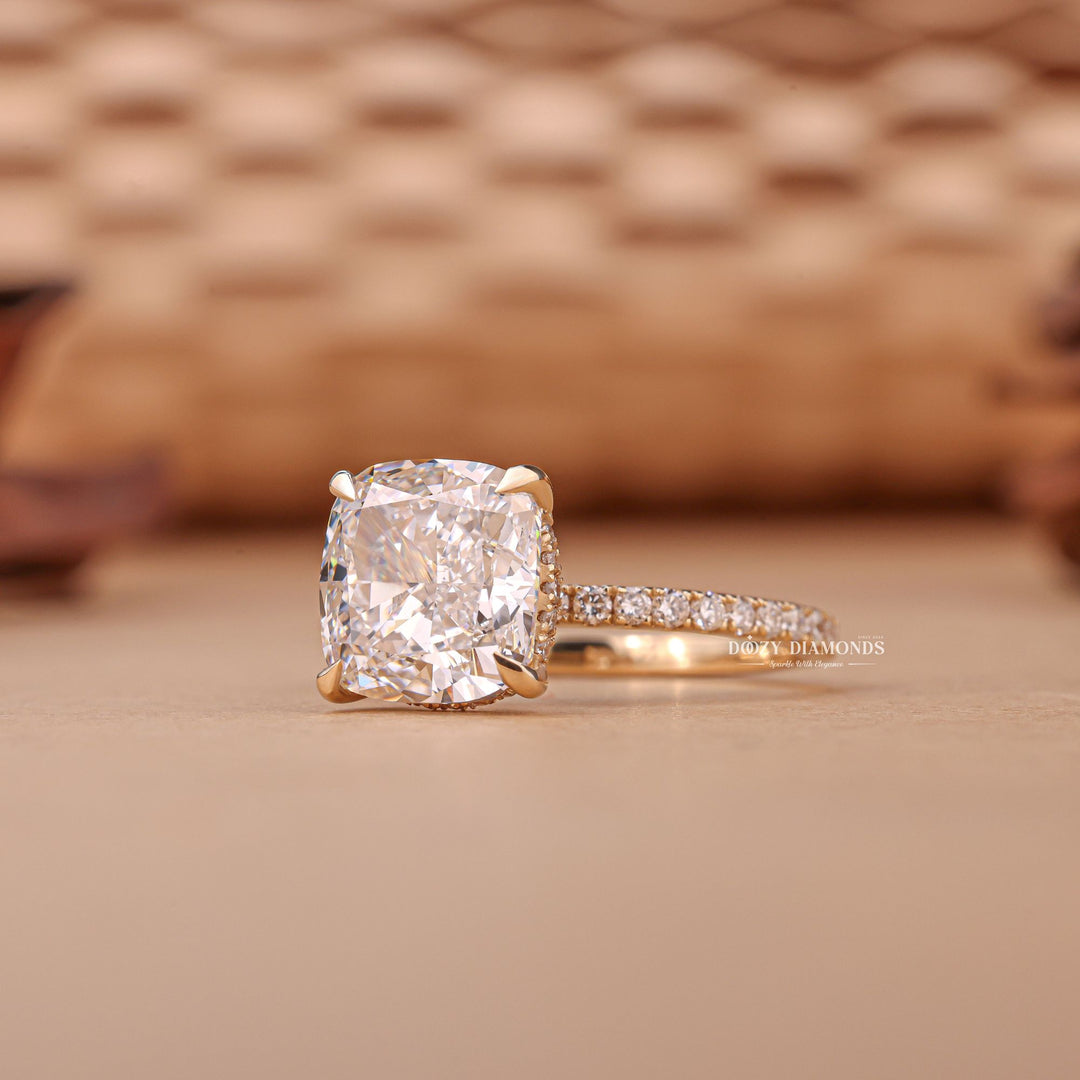 Certified cushion cut diamond featured in hidden halo engagement ring