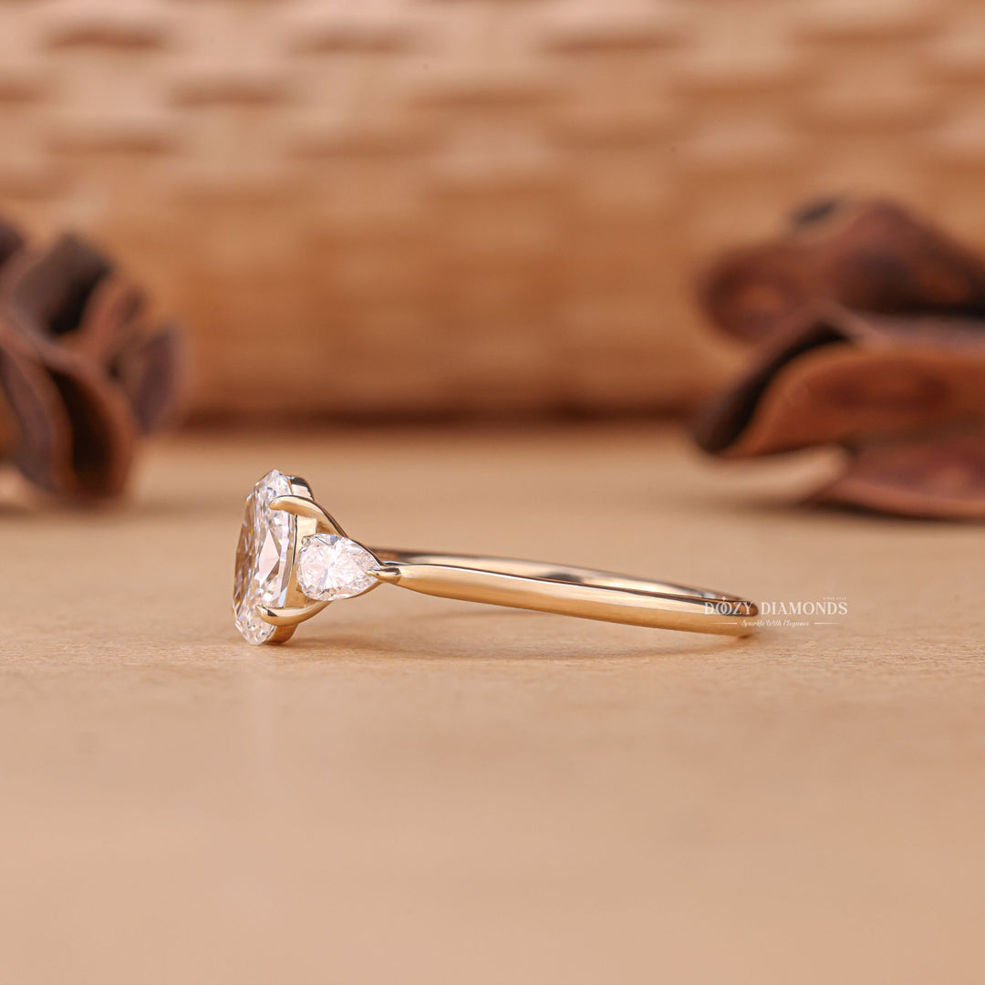 Oval cut three stone engagement ring with IGI certified center diamond