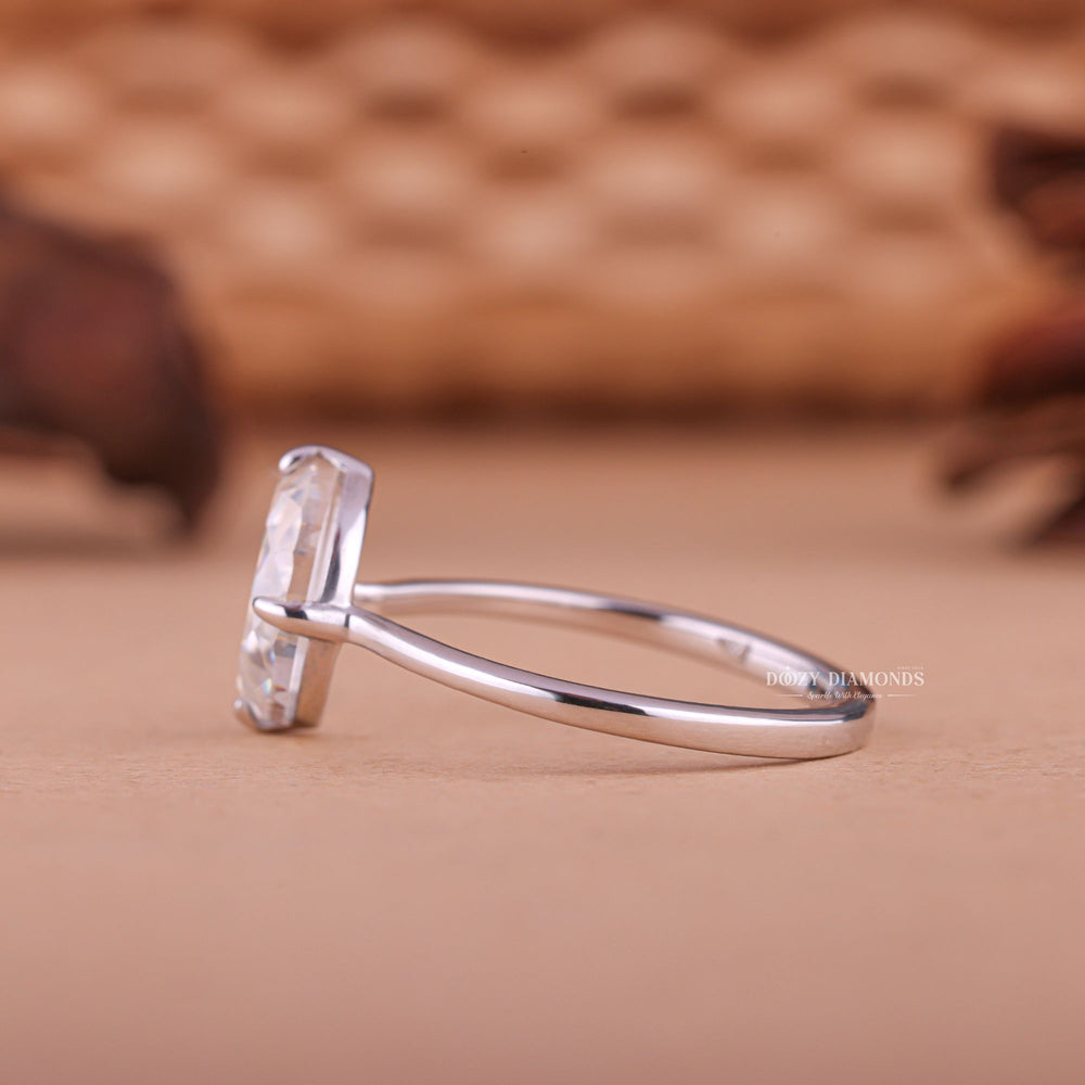 Unboxing view of half moon cut art deco diamond engagement ring