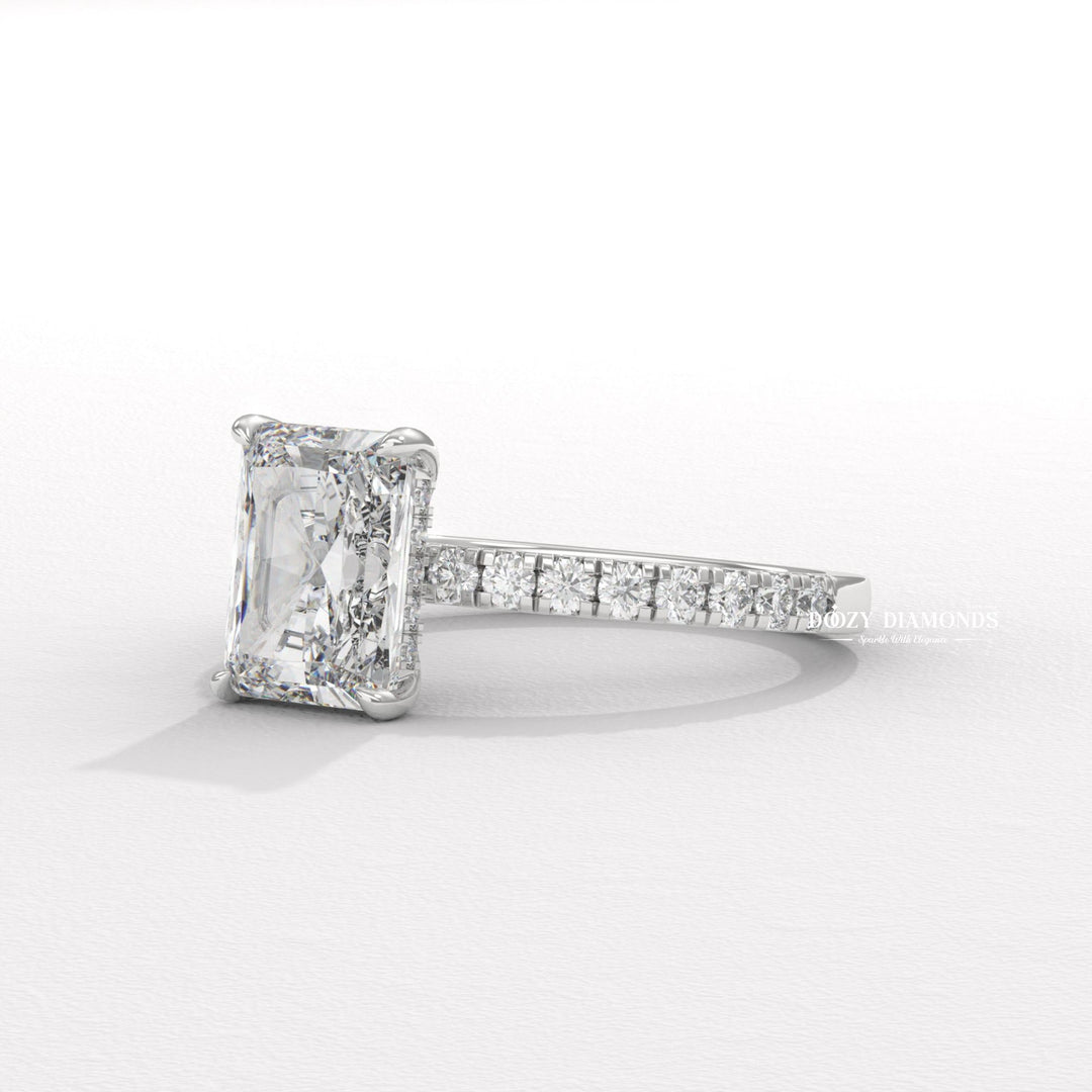 Close-up of radiant cut center diamond in hidden halo engagement ring