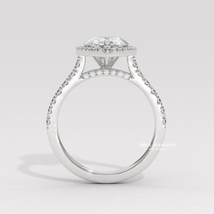Profile view of pear cut halo engagement ring band