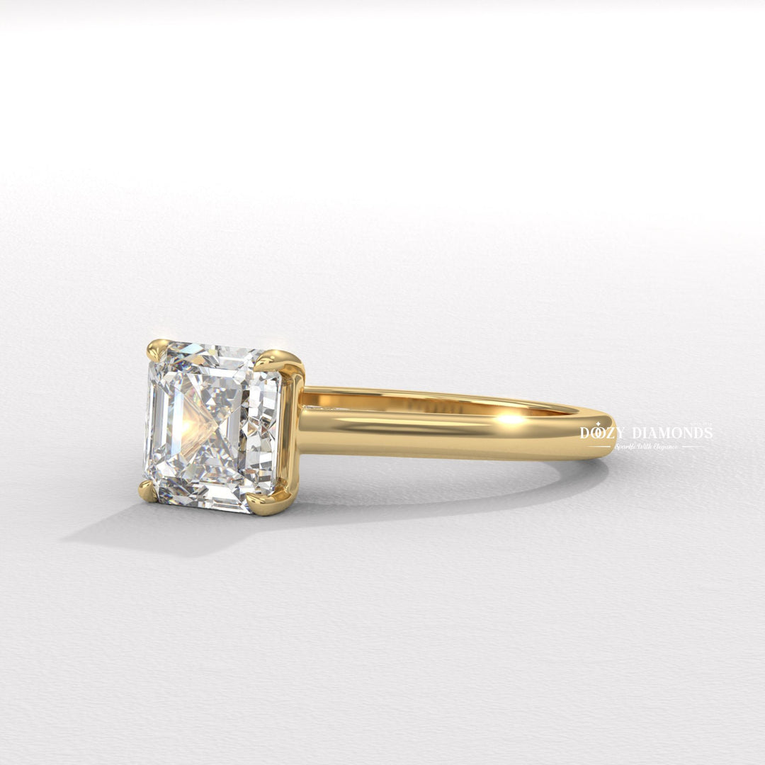 Lifestyle shot of asscher solitaire diamond ring on hand