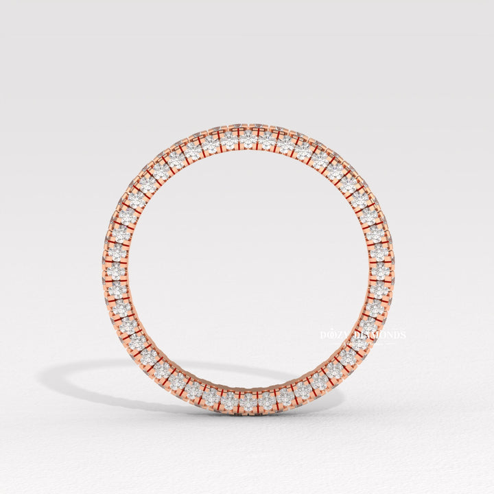 Side view of round diamond wedding band