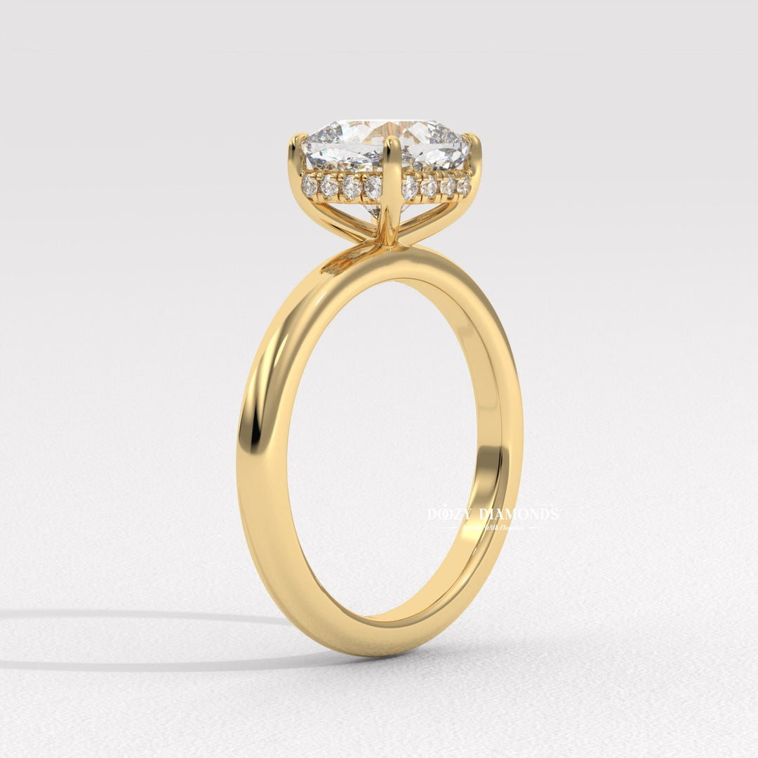 Cushion hidden halo engagement ring shown on hand for true-to-life sizing