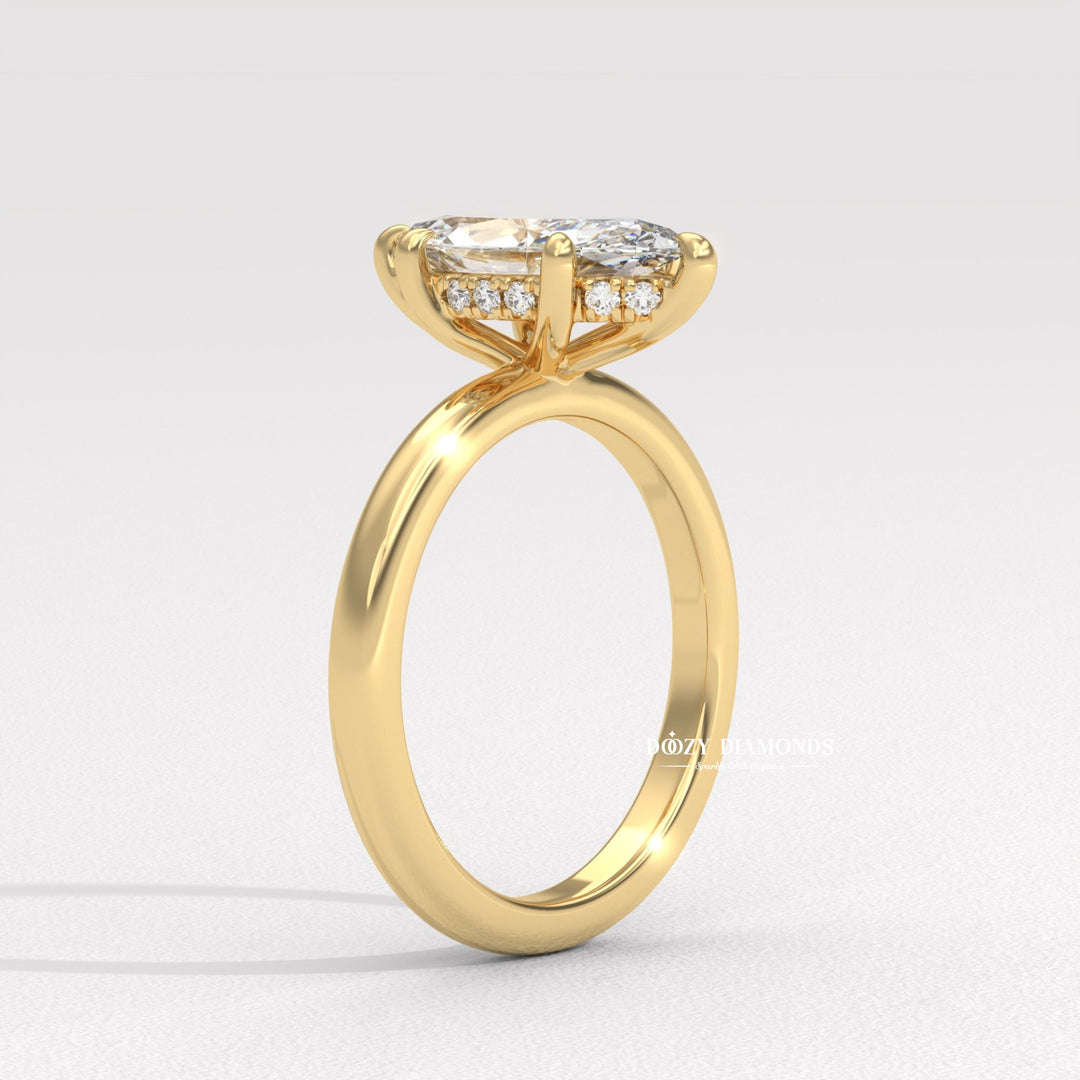 Marquise cut diamond ring worn on hand