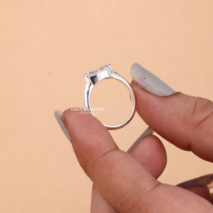 Marquise east west lab grown diamond ring side profile in gold setting