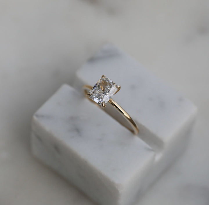 Premium radiant cut solitaire engagement ring crafted in solid gold