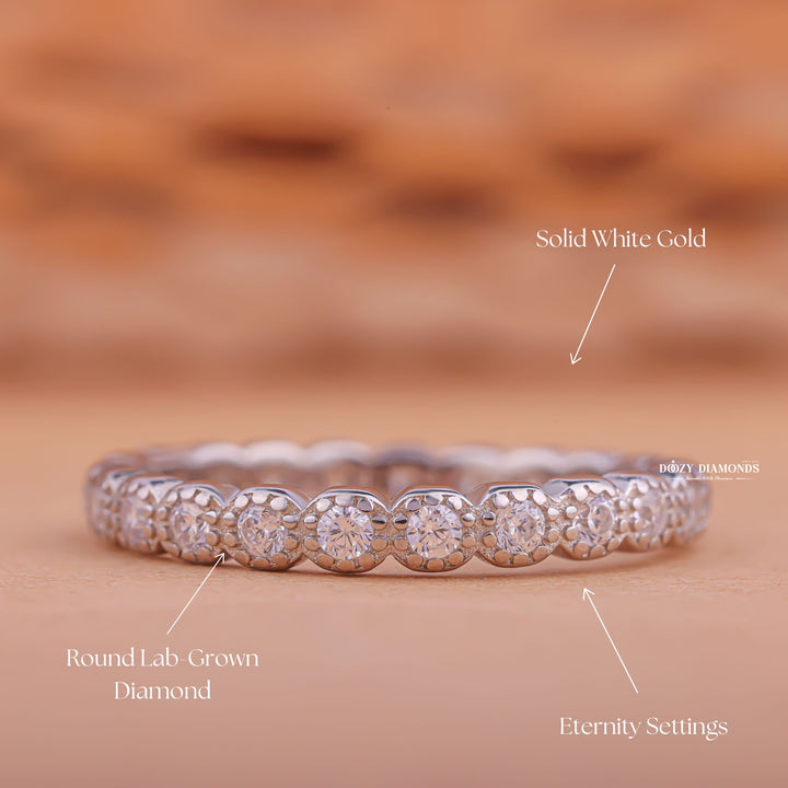 Milgrain diamond wedding band in yellow gold