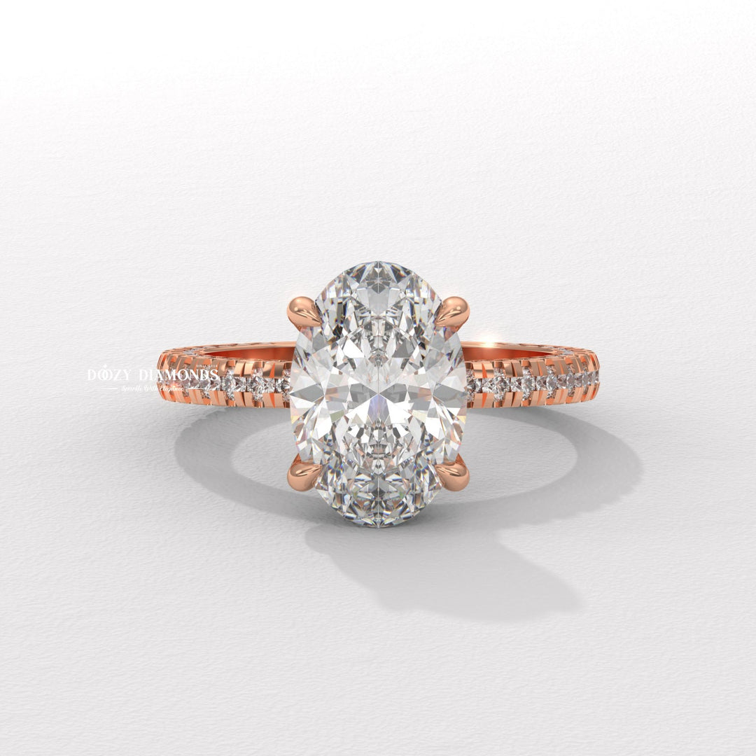 Oval pave engagement ring viewed from the side