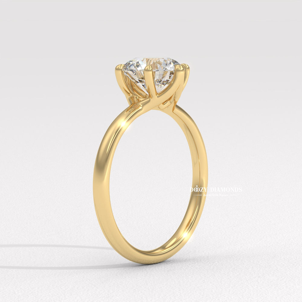 Round cut engagement ring shown with authenticity certificate