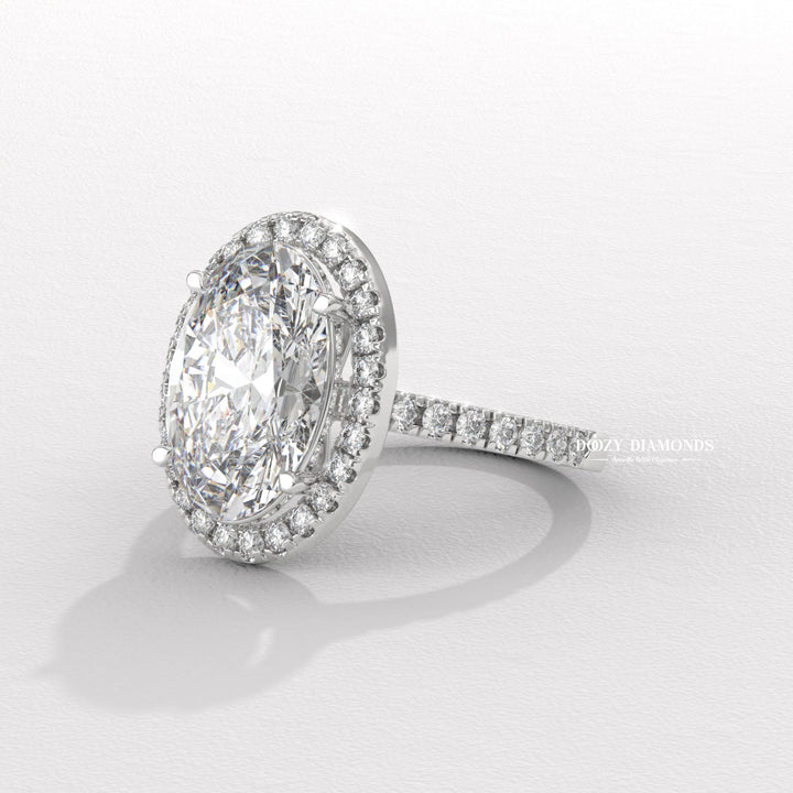 Oval halo ring set with an IGI graded diamond