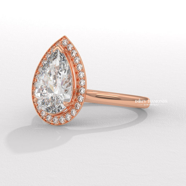 Handcrafted pear cut halo lab grown diamond engagement ring