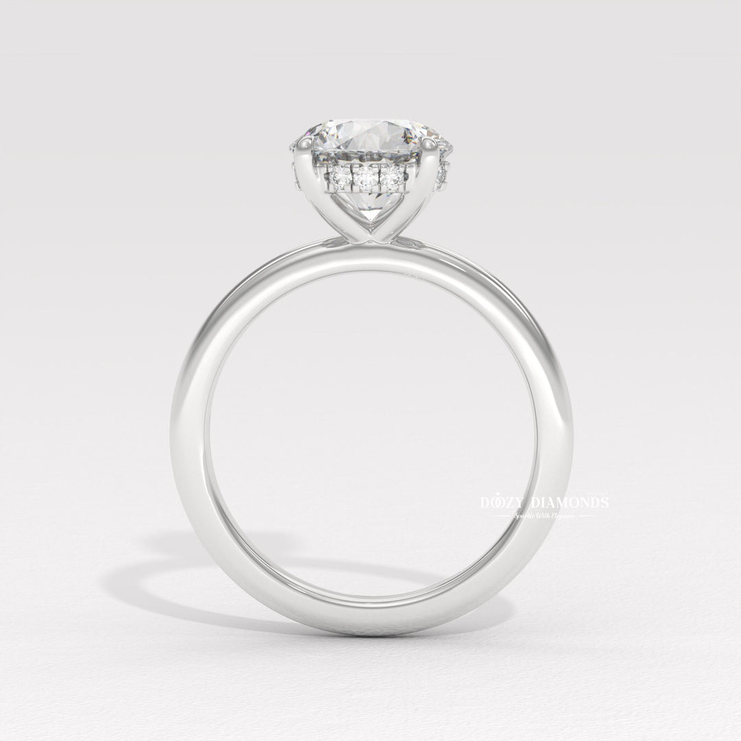 Round hidden halo engagement ring close-up showing high clarity diamond clarity