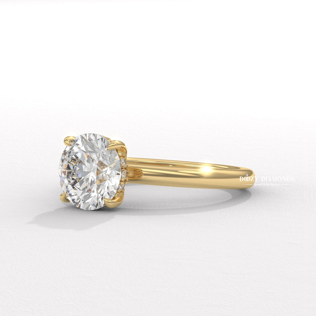 Fine craftsmanship detail on round hidden halo engagement ring