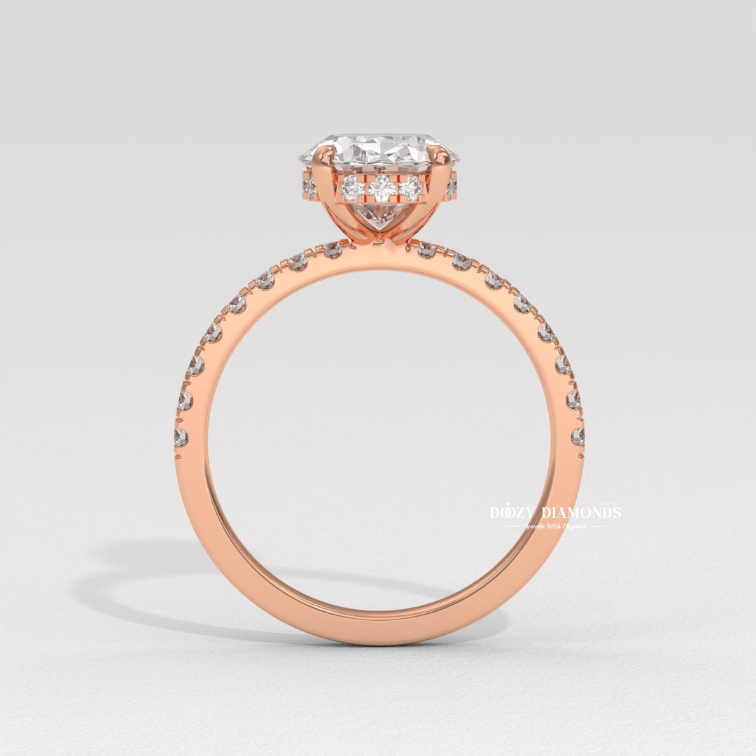 Profile view of oval cut hidden halo engagement ring band