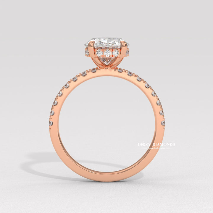 Profile view of oval cut hidden halo engagement ring band