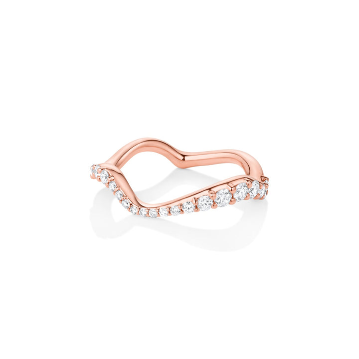 Round diamond band stacked with engagement ring
