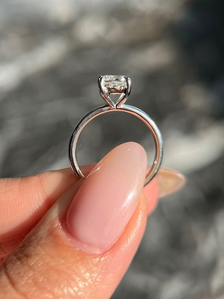 Cushion solitaire lab grown diamond ring fitted on finger