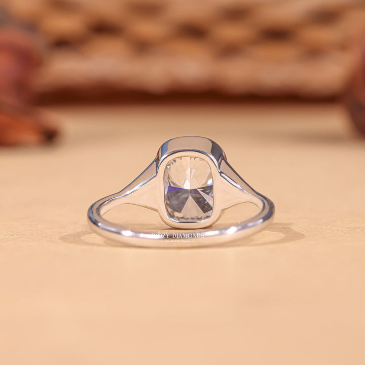 Cushion cut bezel engagement ring with IGI certified center diamond