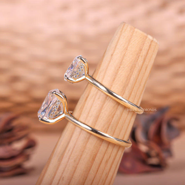 Cushion hidden halo engagement ring finished in polished solid gold
