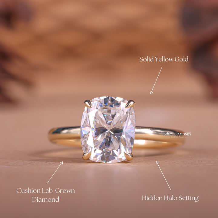 Cushion hidden halo engagement ring finished in polished solid gold