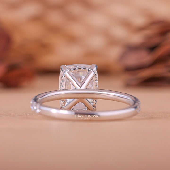 Cushion hidden halo engagement ring with brilliant diamond sparkle