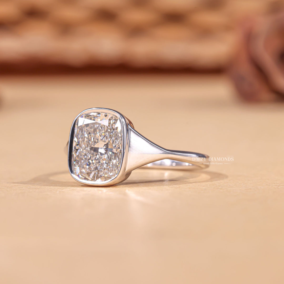 Lifestyle shot of cushion bezel diamond ring on hand