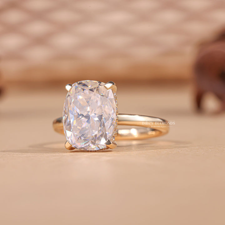 Cushion cut hidden halo engagement ring with IGI certified center diamond