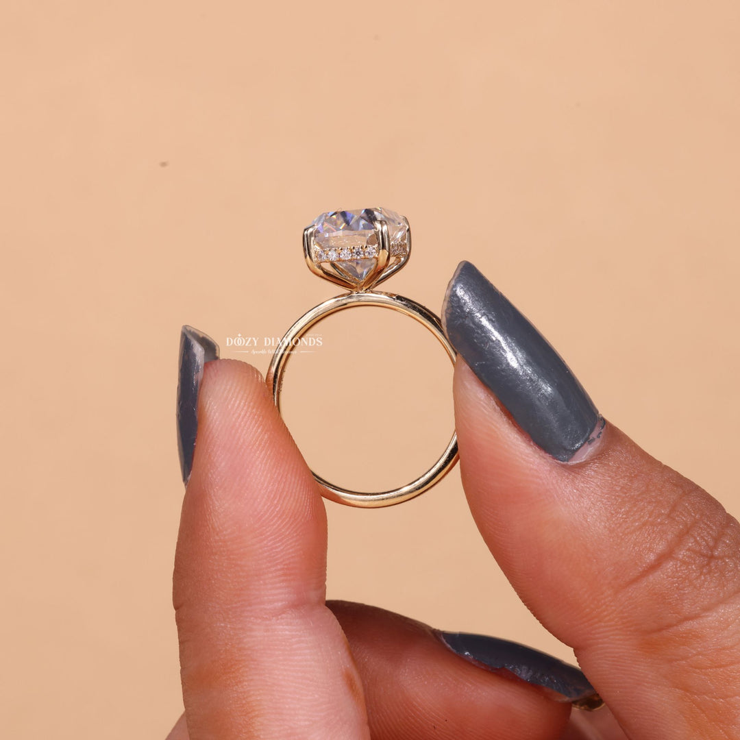 Cushion cut hidden halo engagement ring shown in real-life wear