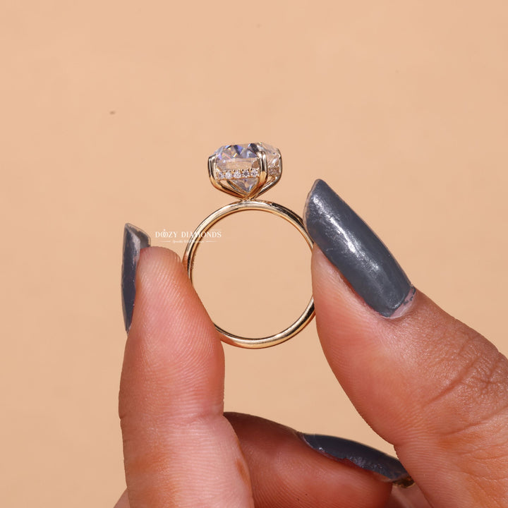 Cushion cut hidden halo engagement ring shown in real-life wear