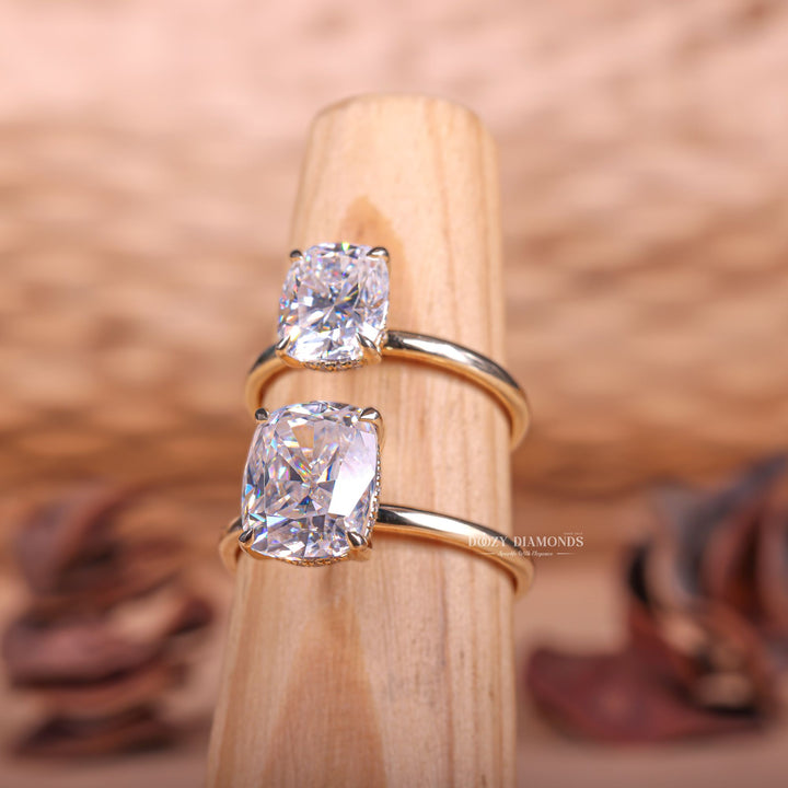 Cushion hidden halo engagement ring photographed in natural light