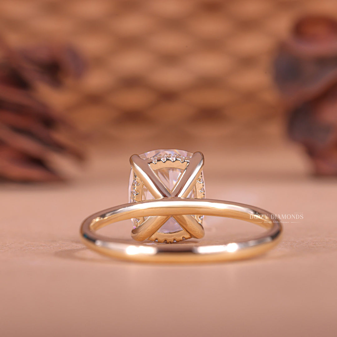Fine craftsmanship detail on cushion hidden halo engagement ring