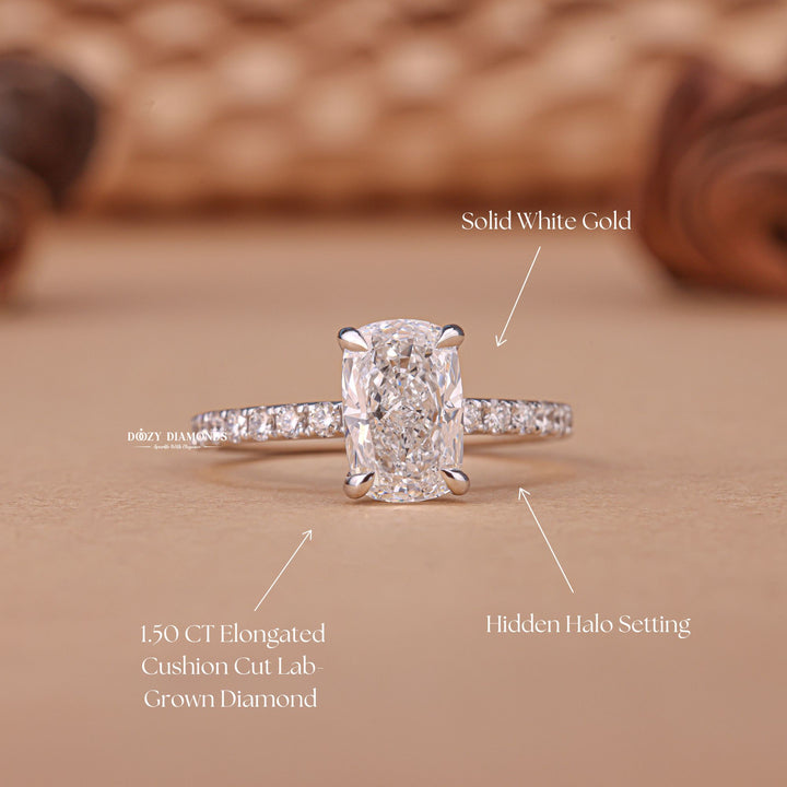 Cushion pave engagement ring close-up showing E/VS1 diamond clarity