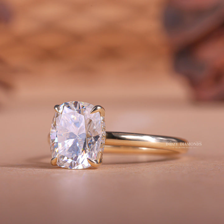 Fine craftsmanship detail on cushion hidden halo engagement ring