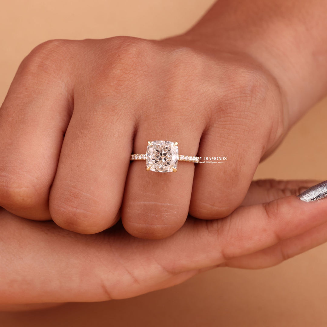 IGI certified cushion cut diamond in hidden halo engagement ring setting