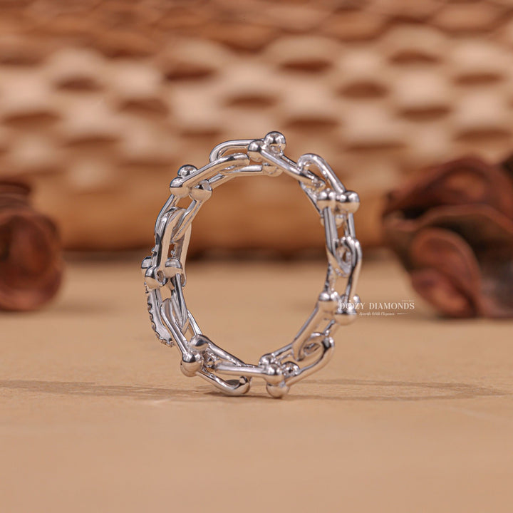 Designer diamond band stacked with engagement ring