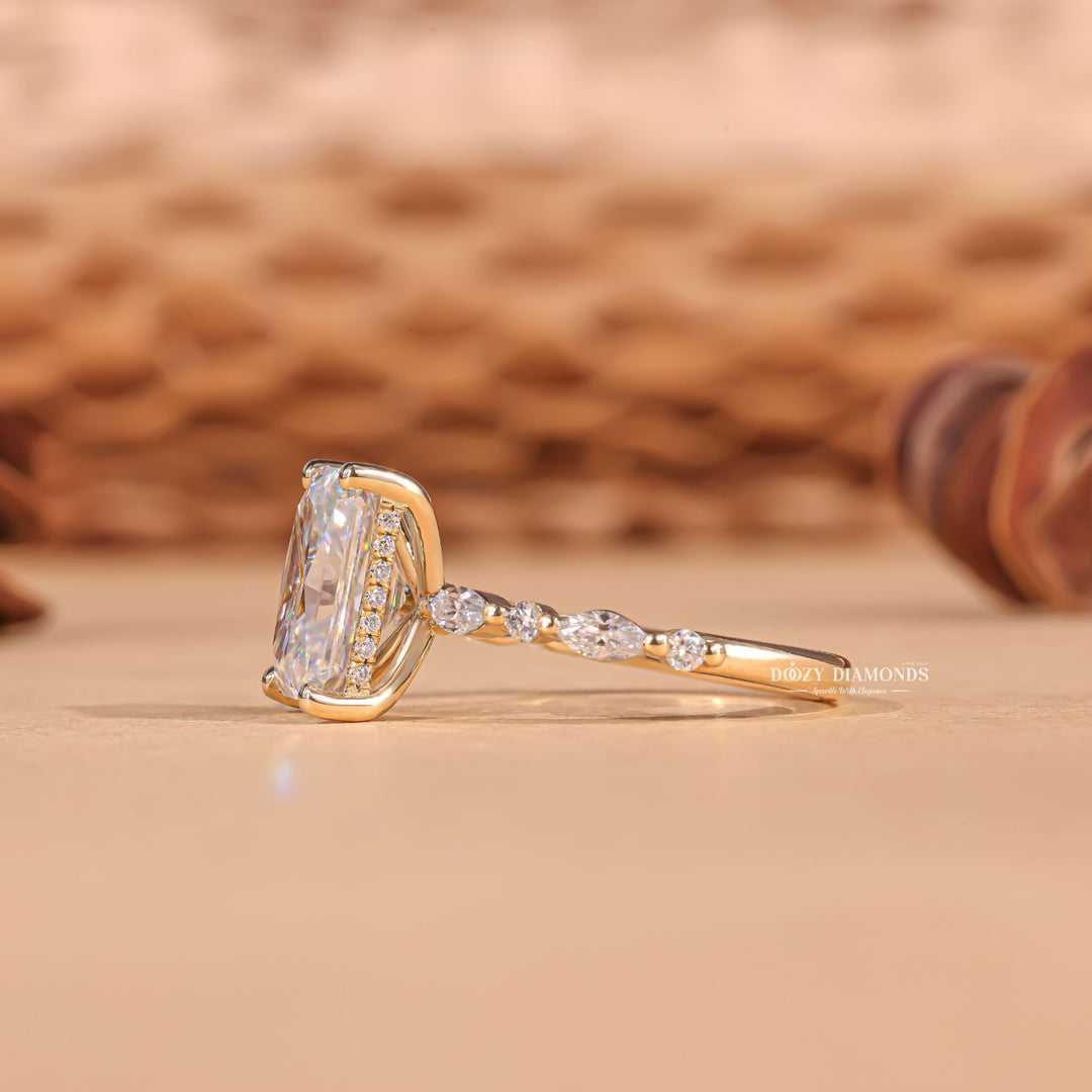 Radiant cut diamond ring worn on hand