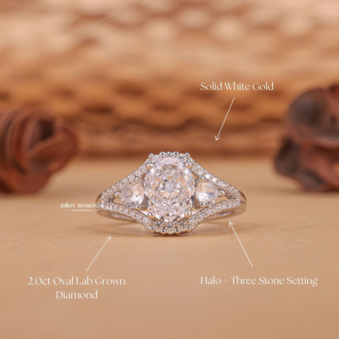 Macro shot of oval cut diamond facets in three stone ring setting