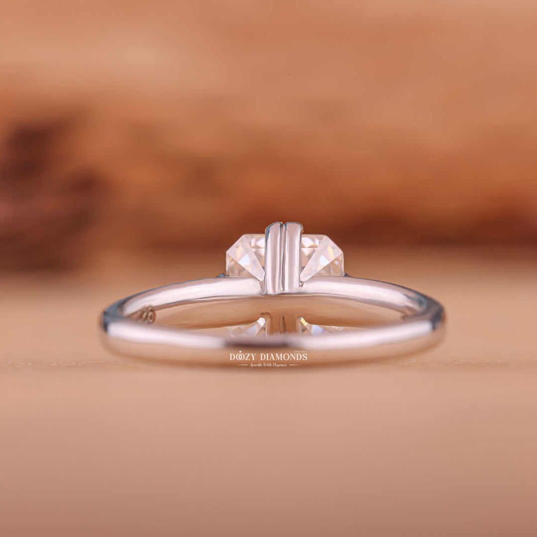 Certified asscher cut diamond featured in solitaire engagement ring