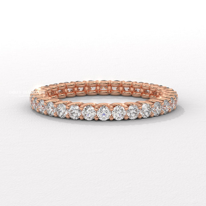 Stackable lab grown diamond band worn on hand