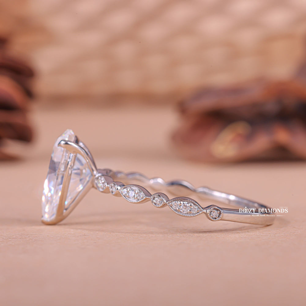 Shop the pear cut pave engagement ring collection online