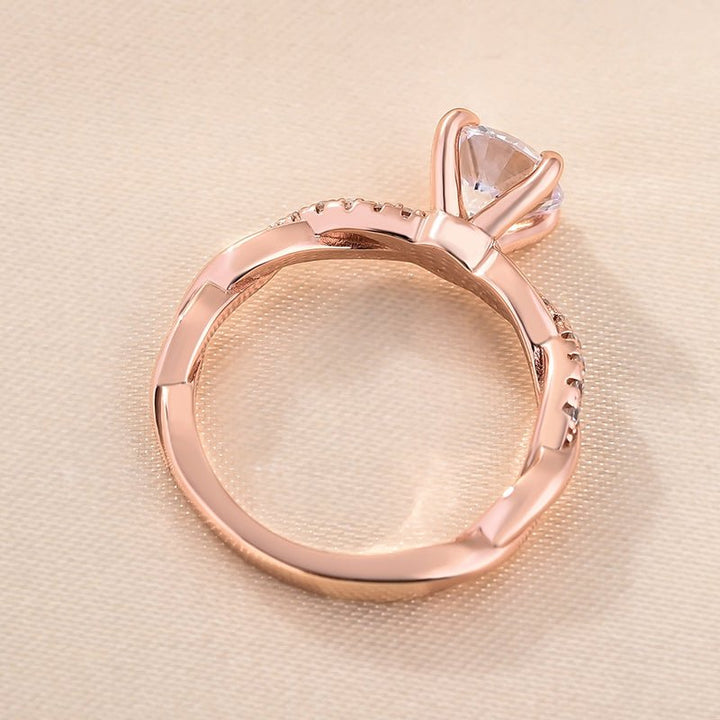 Side angle of round pave diamond engagement ring