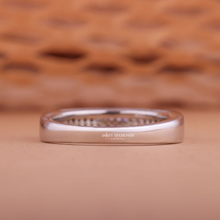 Round diamond band stacked with engagement ring