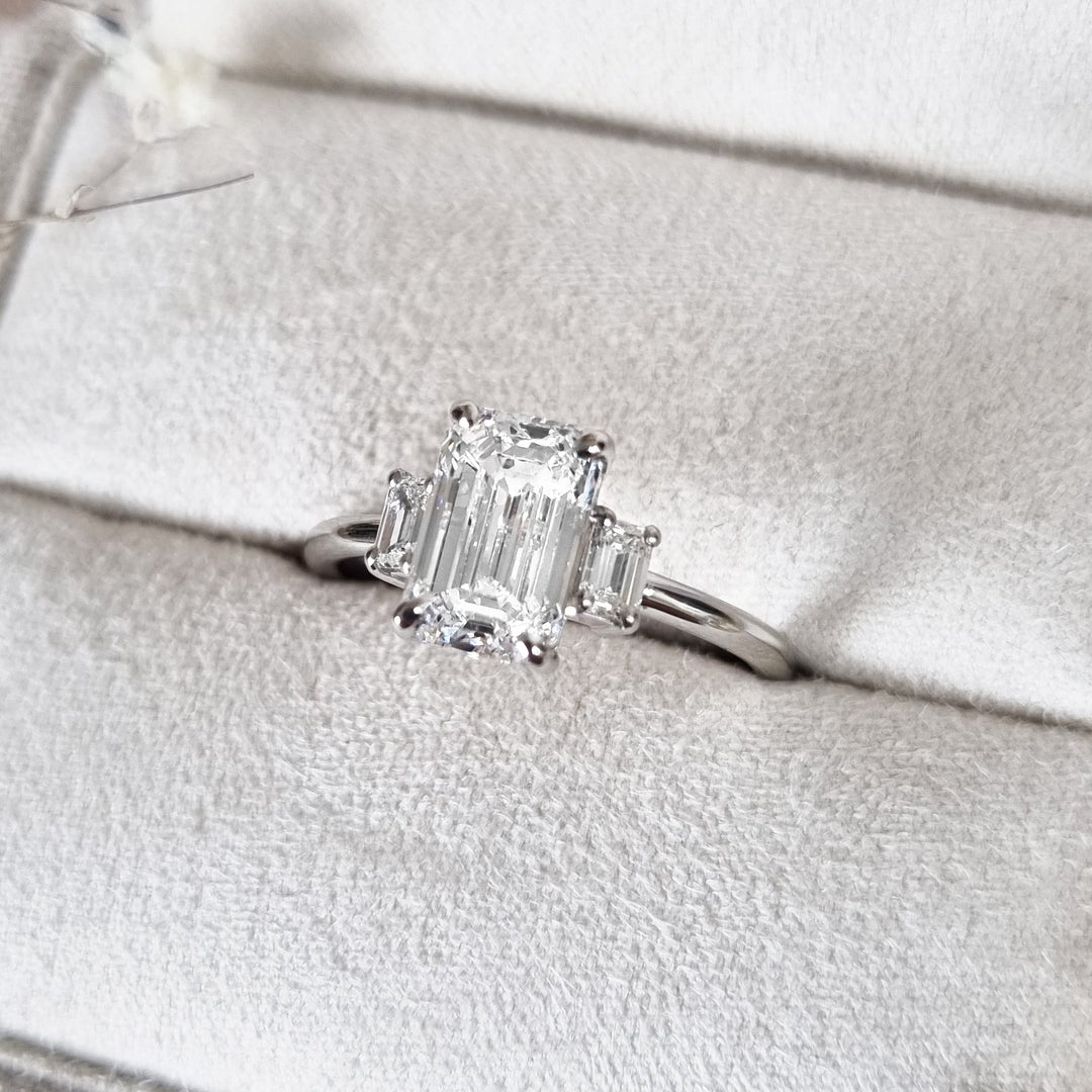 Shop emerald cut three stone lab grown diamond engagement ring online